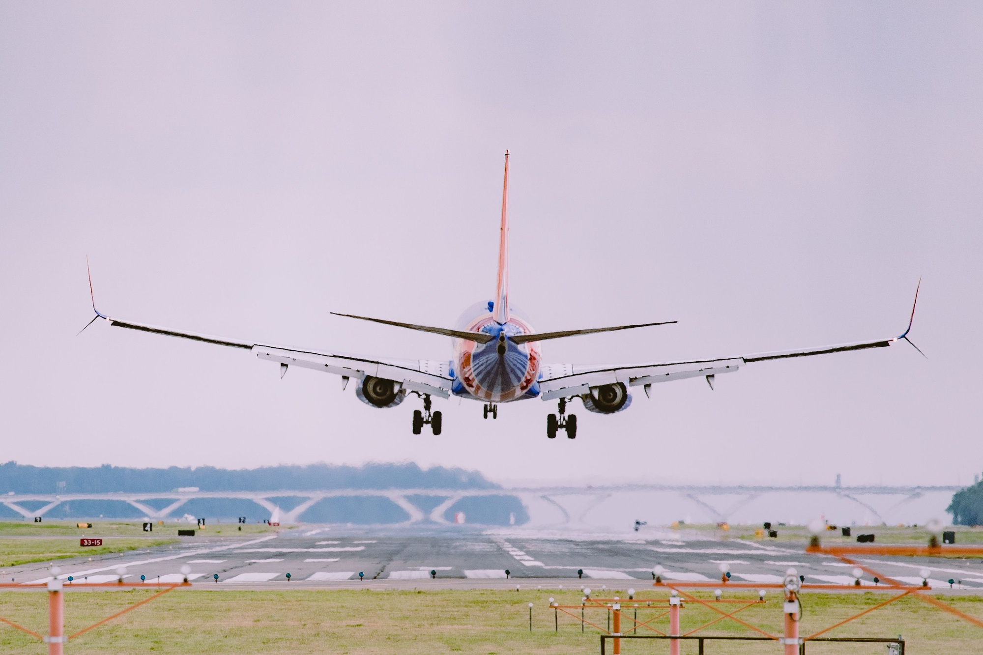 Airplane preparing for landing at the airport | SUPERPOBYT Travel