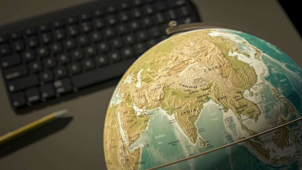 Globe on a desktop shows India | SUPERPOBYT Travel